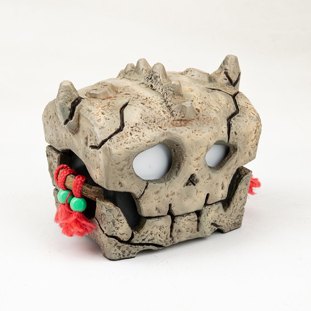 Front view of ProtoX Cursed Skull game storage chest with realistic stone texture and red tassel details.